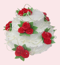 Фотография свадебного торта в три яруса, белый с красными розами